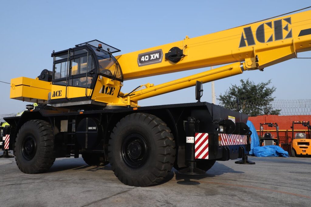 ACE 40 XW crane displayed at a construction site in Faridabad, Haryana, India.